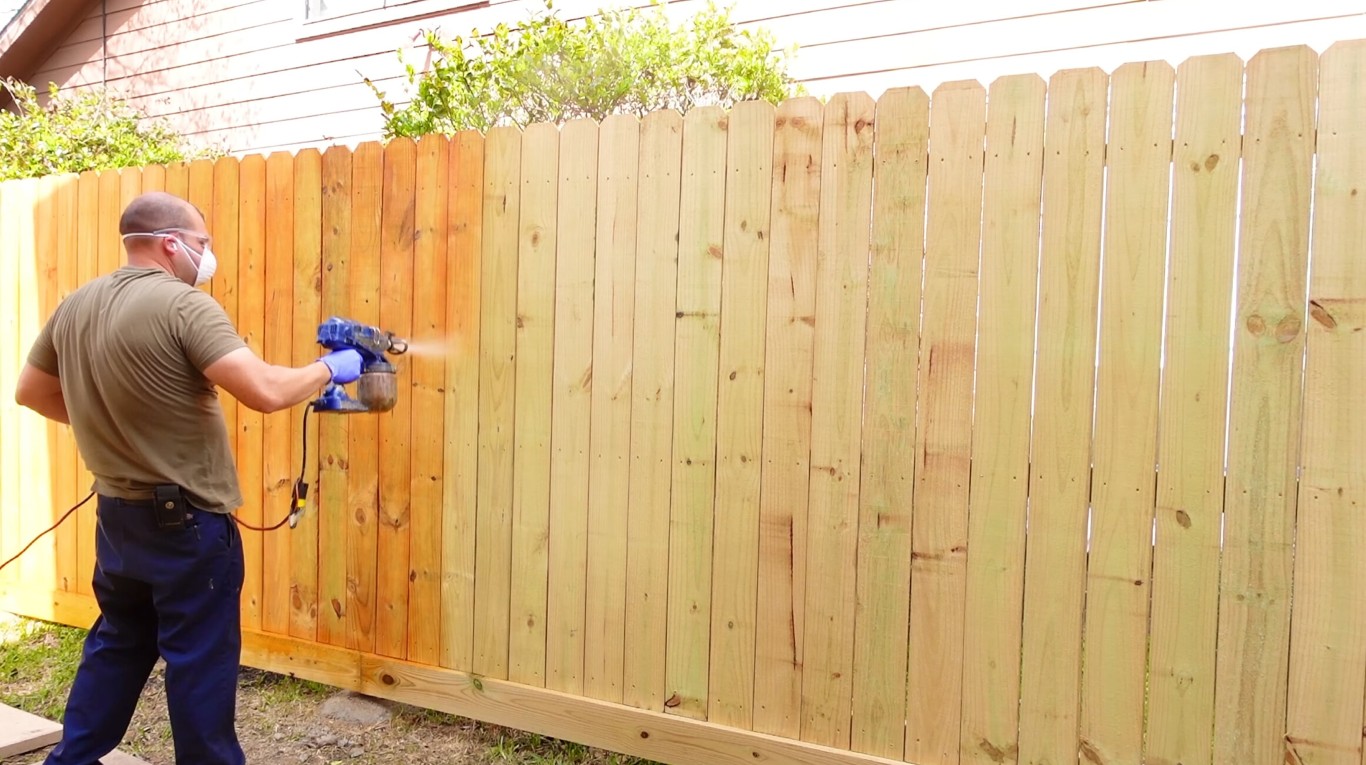 Professional wood fence staining and repair